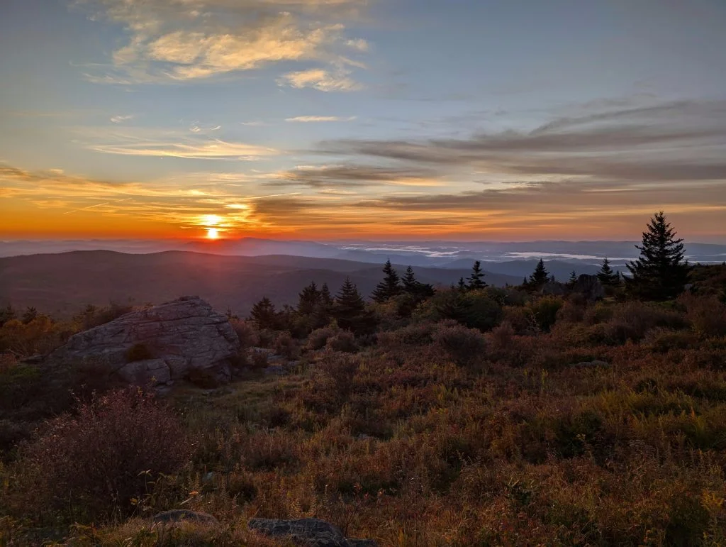 Sun rises above horizon in Grayson Highlands.